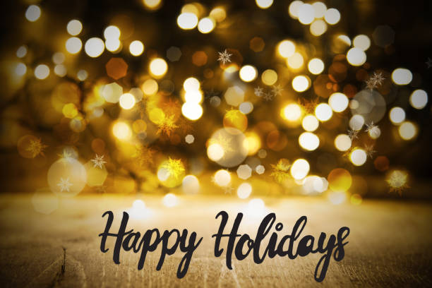 christmas golden lights fondo, caligrafía felices fiestas - happy holidays fotografías e imágenes de stock