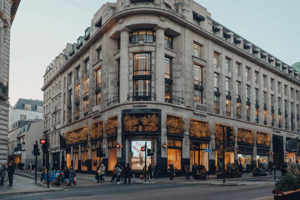 Christmas lights and decorations on the exterior Burberry Store on Regent Street, London, UK. stock photo