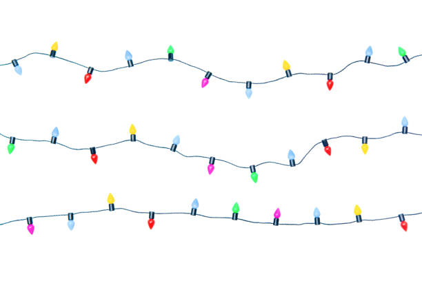 Christmas lights string isolated on white background With clipping path Christmas lights string isolated on white background With clipping path christmas lights stock pictures, royalty-free photos & images