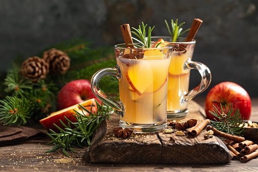Christmas mulled apple cider with cinnamon and anise, traditional winter warming hot drink, beverage or cocktail