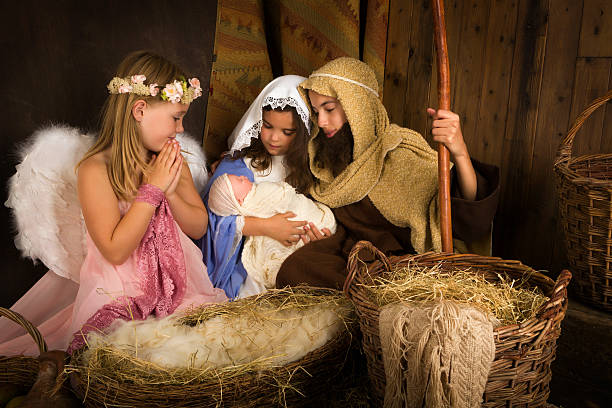 christmas-nativity-with-angel-picture-id521322105?k=20&m=521322105&s=612x612&w=0&h=ZGqJqlyZy0M_uSJ-4rbWTQ7vDyisCdzTlZpPiwFrcXY=