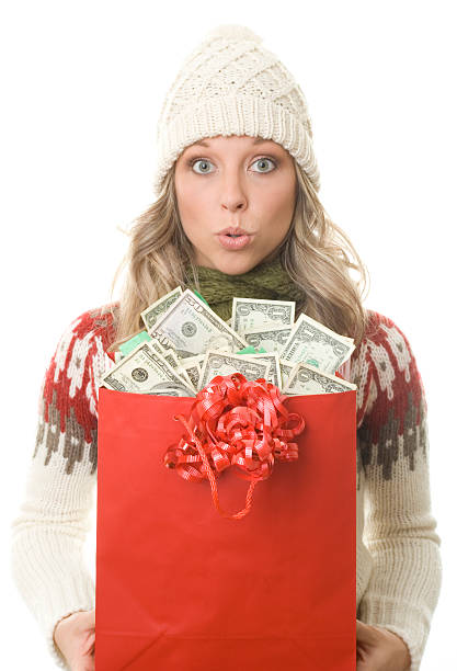 Christmas Shopper Money Surprise stock photo