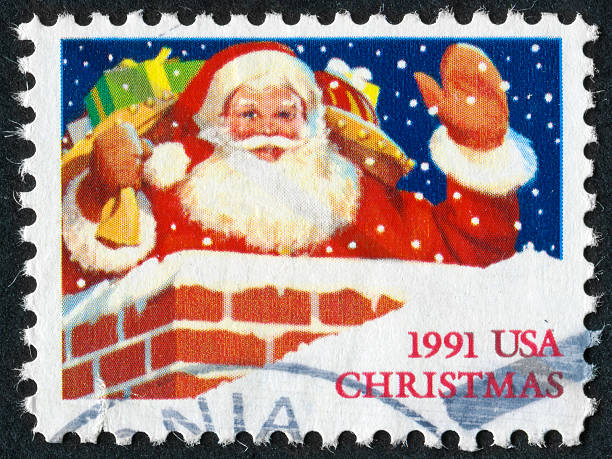Christmas Stamp Cancelled Stamp From The United States Featuring Santa Claus 1991 stock pictures, royalty-free photos & images