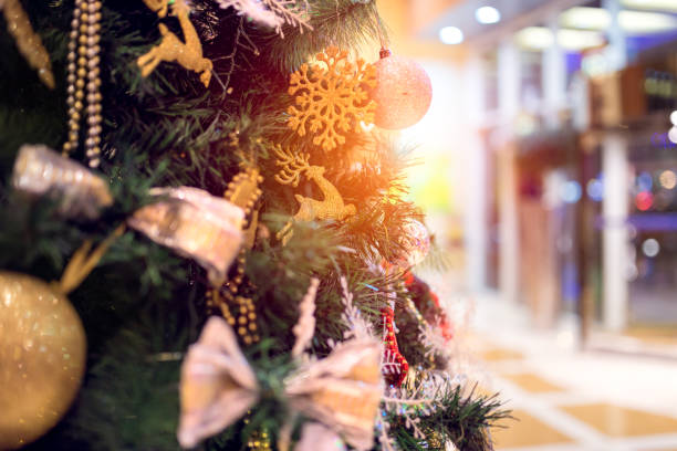 Christmas tree in modern hotel during Christmas Day. stock photo