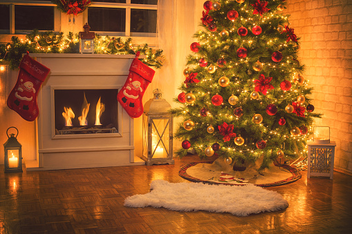 Christmas Tree Near Fireplace At Home Stock Photo - Download Image Now - iStock