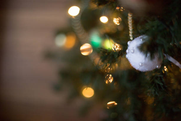 Christmas tree with lights and decorations with soft focus stock photo