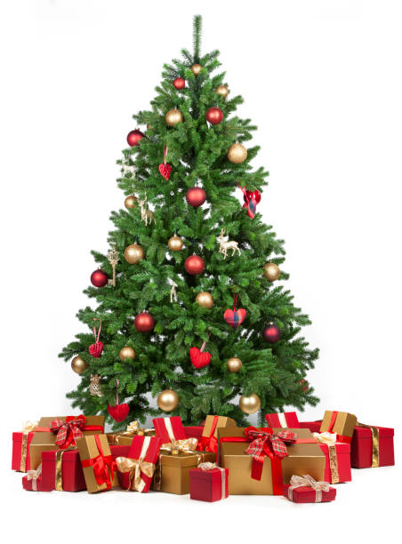 Christmas tree with many presents under it stock photo