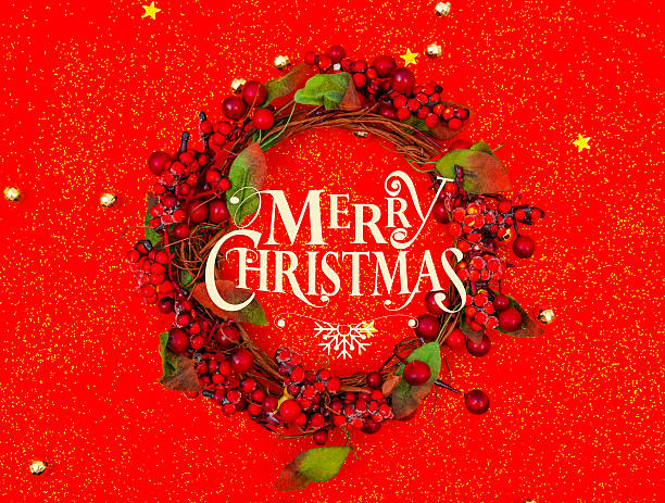 Christmas wreath and decoration on red background stock photo