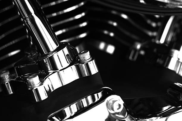 Chrome II Black and white photo of shiny chrome motorcycle engine parts bolt fastener stock pictures, royalty-free photos & images