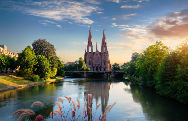 Church in Strasbourg Reformed Church of St. Paul in Strasbourg at sunrise, France strasbourg stock pictures, royalty-free photos & images