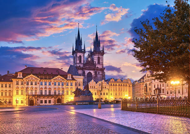 Church of our Lady before tyn Prague Church of our lady before tyn on Old Town Square Prague Czech republic with red roof sunset sky. prague old town square stock pictures, royalty-free photos & images