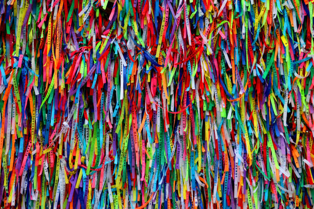 Church of Our Lord of Bonfim with ribbons. Igreja de Nosso Senhor do Bonfim, a catholic church located in Salvador, Bahia in Brazil. Famous touristic place where people make wishes while tie the ribbons in front of the church. Carnival land. bahia state stock pictures, royalty-free photos & images