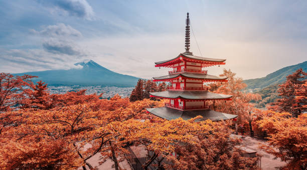 Chureito Pagoda and Mt.Fuji at sunset Fujiyoshida, Japan - June 08, 2018: The Chureito Pagoda, a five-storied pagoda also known as the Fujiyoshida Cenotaph Monument, on the top of viewpoint can see mt. Fuji on the background. shrine stock pictures, royalty-free photos & images