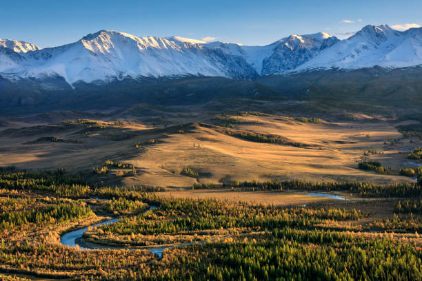 Chuya river, Kurai steppe and mountain range at sunset. Siberia. Altai Republic. Russia Autumn landscape. Long exposure altai mountains stock pictures, royalty-free photos & images