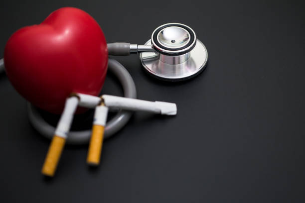 Cigarette smoking causes heart disease. stock photo