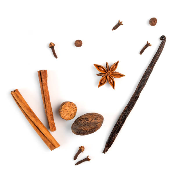 cinnamon, nutmeg and vanilla on a white background stock photo