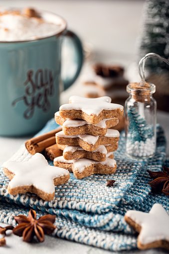 Cinnamon stars cookies, traditional german zimtsterne. Close up of gingerbread cookies. Winter holidays background