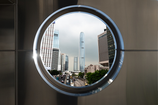 Circle Windows With Modern Buildings In The City Stock Photo