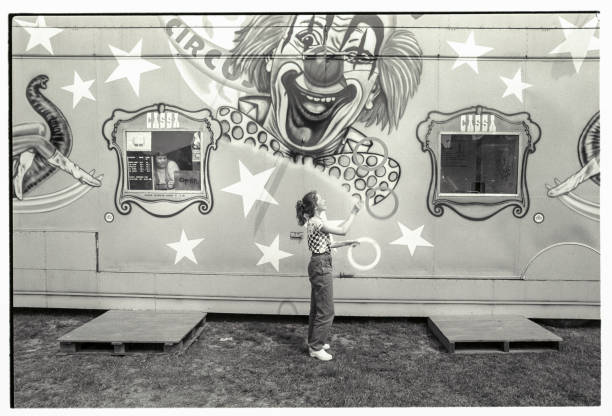 Circus Female Juggler Practising In Front Of The Teller Office