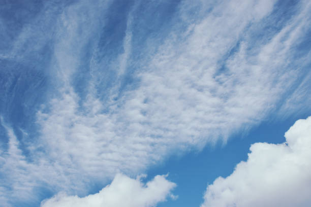 cirrostratus clouds background photo cirrostratus clouds on a summer sky on the Azores, background color photo cirrostratus stock pictures, royalty-free photos & images