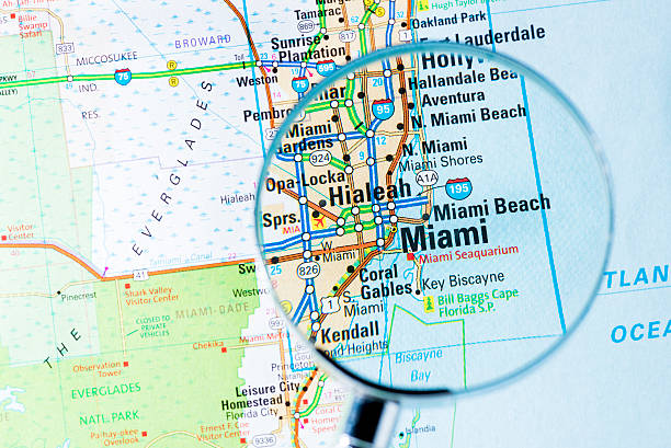 Cities under magnifying glass on map: Miami Cities under magnifying glass on map: Miami florida us state photos stock pictures, royalty-free photos & images