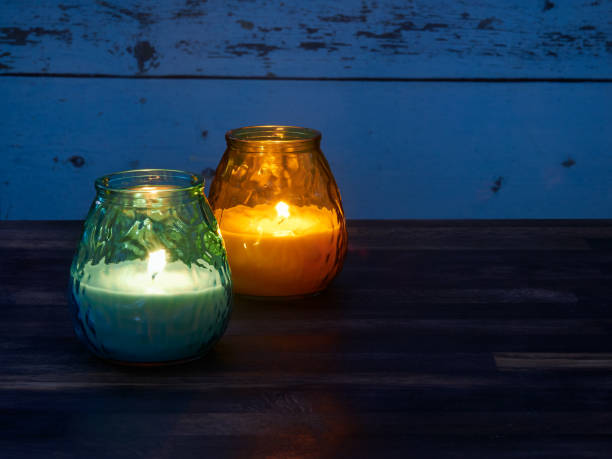 Citronella candles used as mosquito repellant stock photo