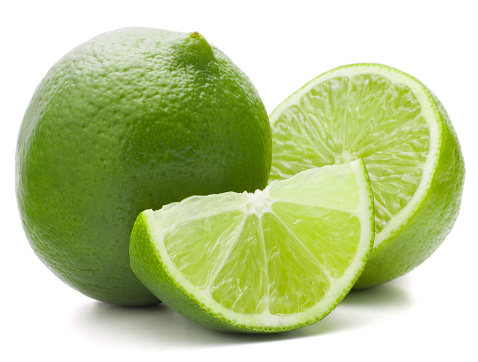 A slice of lime on white background