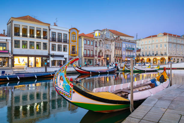 City of Aveiro in the north of Portugal with the water canals by night. stock photo