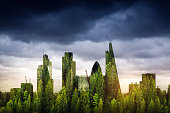 City of London, one of the leading centres of global finance, covered with forest. Green London /  double exposure.