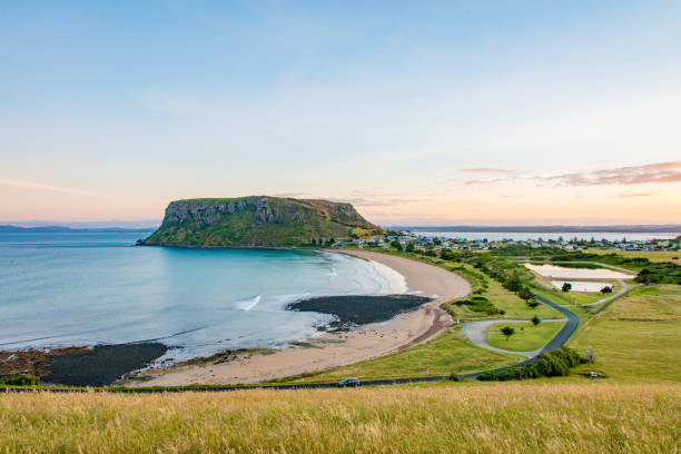 City of Stanley and green landscape and blue sea in Tasmania, Australia View at the landscape and beaches of Stanley, Tasmania, Australia. In the back the famous landmark is showing, the mountain, The Nut. tasmania photos stock pictures, royalty-free photos & images