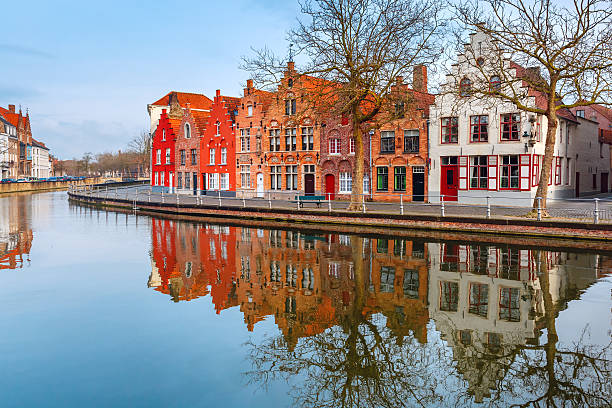 City view of Bruges canal with beautiful houses Scenic city view of Bruges canal with beautiful medieval houses, Belgium brugge, belgium stock pictures, royalty-free photos & images