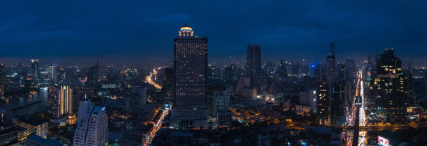 Cityscape of business zone in Bangkok at night stock photo
