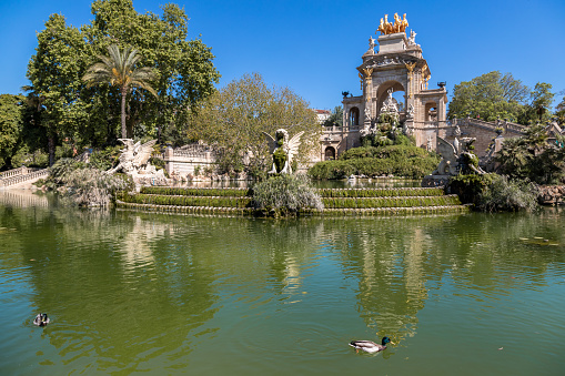 Picture of the famous castle with fountains of Ciutadella Park in Barcelona taked in a sunny day.