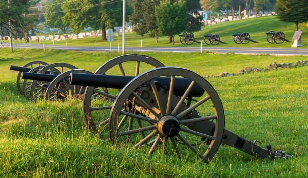 Civil War cannons lined up near the Evergreen Cemetery in Gettysburg, Pennsylvania, USA stock photo