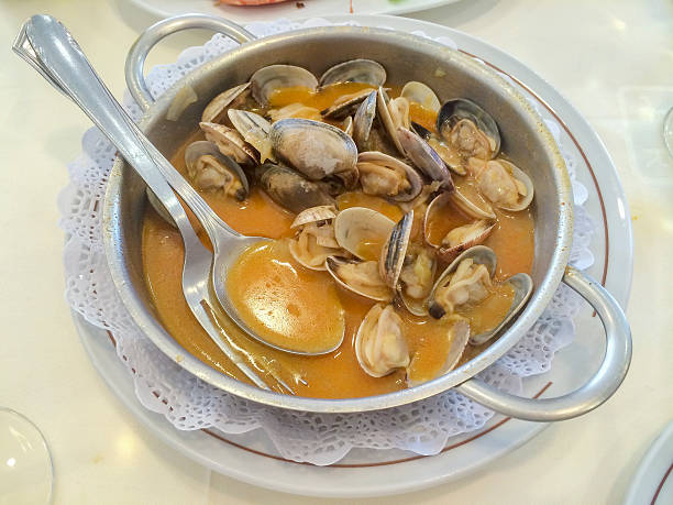 Clams in seafood sauce stock photo