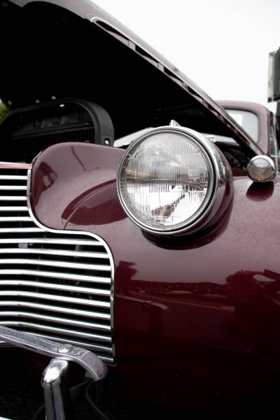 Classic Car with Hood Up Classic maroon car with the hood up michelle tresemer stock pictures, royalty-free photos & images