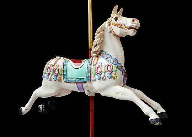 Classic carousel horse A classic carousel horse on black. Clipping path included. carousel horses stock pictures, royalty-free photos & images