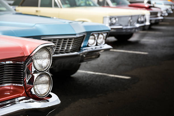 Classic cars Classic cars in a row parked on asphalt parking lot exhibition stock pictures, royalty-free photos & images