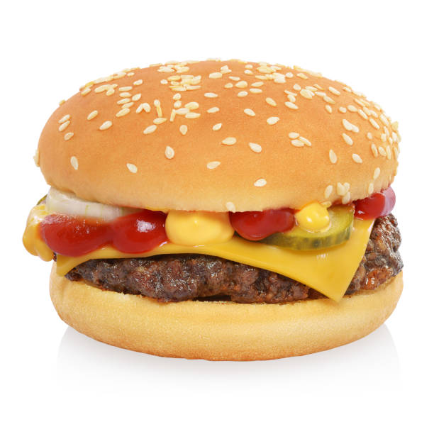 Classic cheeseburger isolated on white Classic cheeseburger with beef patty, pickles, cheese, tomato, onion, ketchup and mustard isolated on white background. cheeseburger stock pictures, royalty-free photos & images