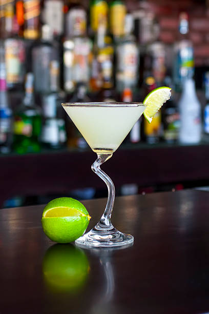 Classic Daiquiri cocktail on the black bar table stock photo
