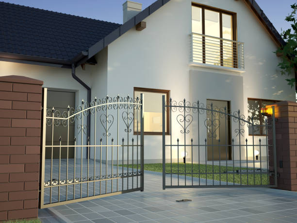 Classic Iron Gate and house Iron Gate and opening mechanism gate stock pictures, royalty-free photos & images