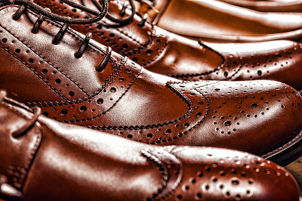 Classic polished men's brown oxford brogues stock photo