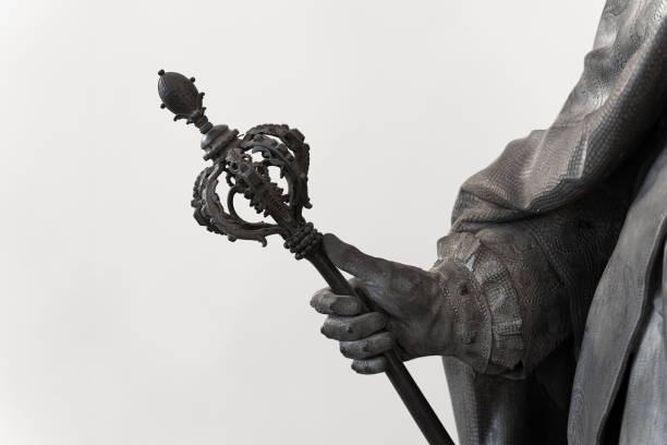 classical statue with hand holding a scepter stock photo