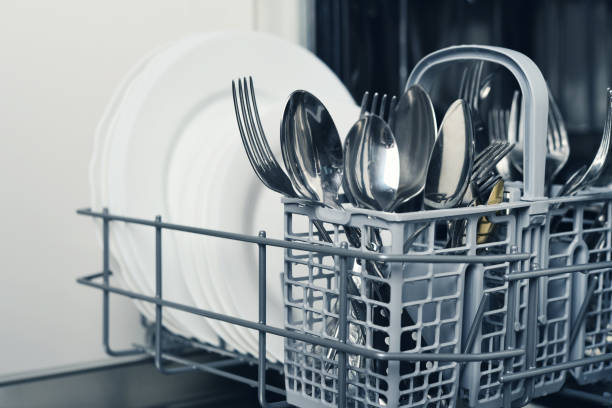 Clean cutlery and plates stock photo