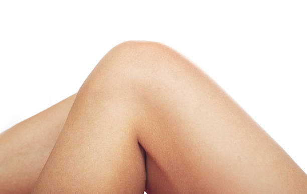 Clean human knee on a white background  stock photo