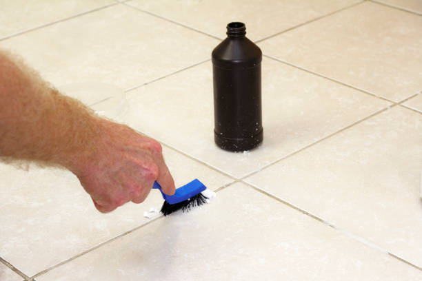 Cleaning Floor Grout with Baking Soda stock photo