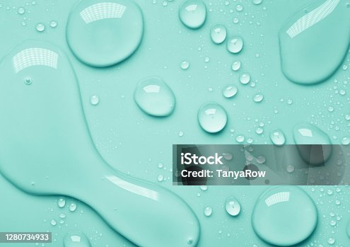 istock Clear transparent water aloe vera cosmetic toner pink aquamarine turquoise blue green gray gel tonic cooling lotion drops 1280734933