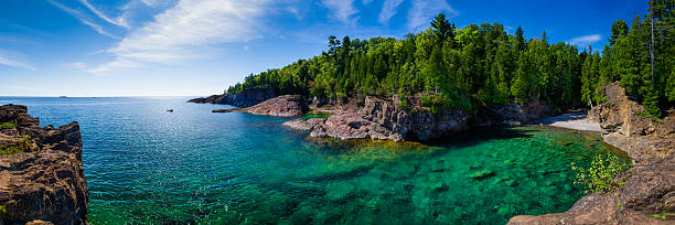 Clear Water Lake Bay Panorama Panorama of rocky beach on Lake Superior. great lakes stock pictures, royalty-free photos & images