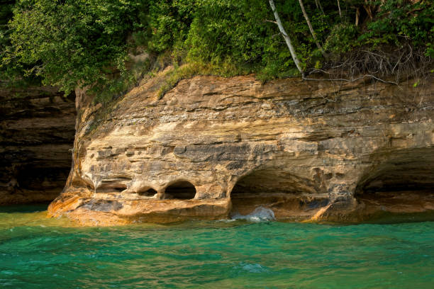 Cliff caves Grand Island stock photo