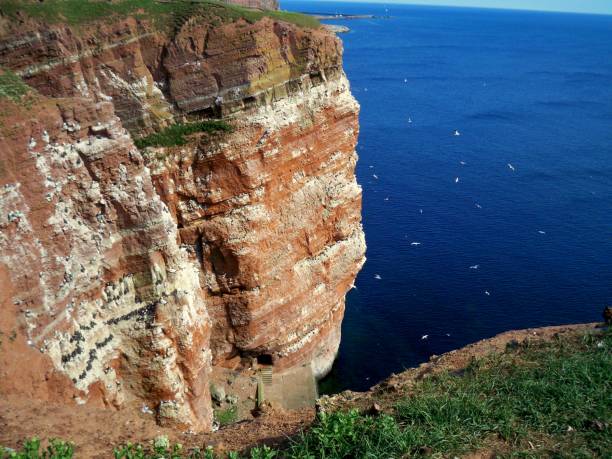 cliff, north sea, helgoland stock photo